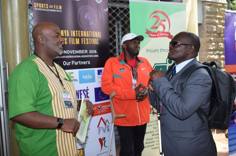 Chris-Kamau-Mathew-Mugenya-and-Douglas-Sidialo-engage-in-a-discussion