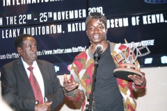 Benjamin-Rachar-makes-a-short-speech-after-receiving-the-trophy-for-best-short-documentary