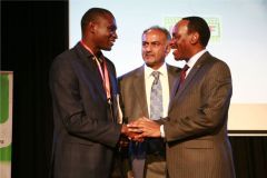 Aasif-Karim-and-Dr.-Ezekiel-Mutua-welcome-David-Rudisha-to-the-opening-ceremony