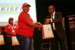 Florence-Nduta-receives-gift-hamper-from-Samy-Lui