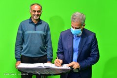 Aasif-Karim-witnesses-as-Iranian-Ambassador-to-Kenya-HE-Jaffer-Bamarki-as-he-signs-the-guest-book