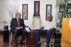 Aasif Karim and Chief Juror John Sibi Okumu on set in the opening ceremony