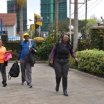 Time to Take A Hike: Walking The Talk Panel Moderator, Madam Njoki Muhoho leads the way to the Studio.