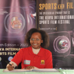 Ms. Shewada Kabuthi from KENYA FILM SCHOOL, Signs The KISFF Visitors Book.